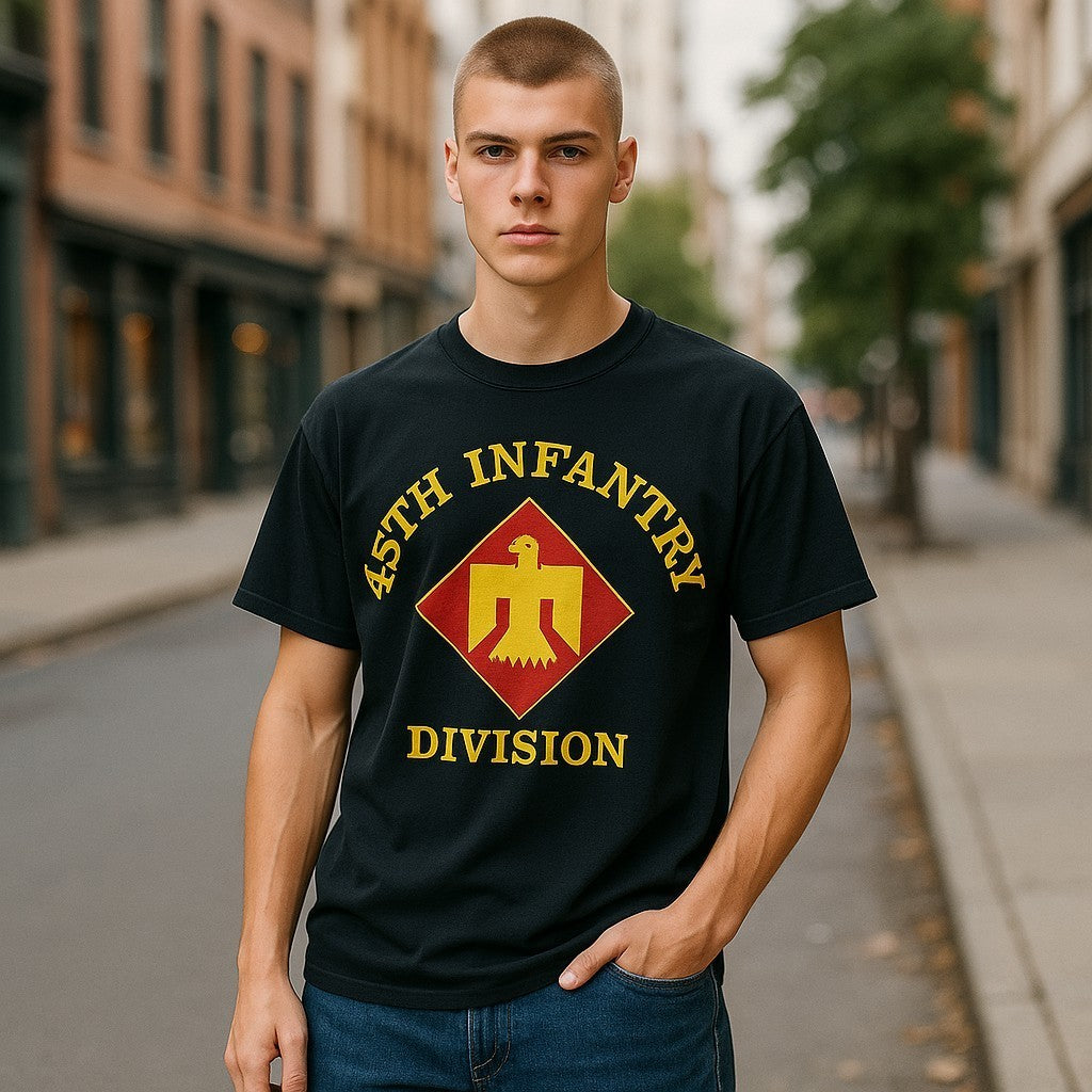 Person wearing a black t-shirt with '45th Infantry Division' design on a city street.