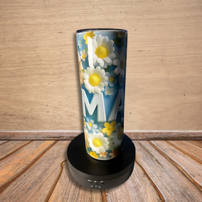 A blue metal tumbler with a floral design and the word 'MAMA' in bold letters.