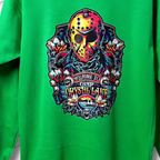 A long sleeve green t-shirt with a graphic print of a horror movie character and the text 'Crystal Lake'.