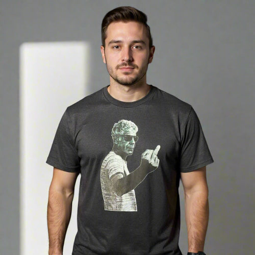 Man wearing a black t-shirt with a graphic design on a black background
