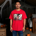 Person wearing a white t-shirt with Halloween-themed graphic and text in a dark, festive setting.