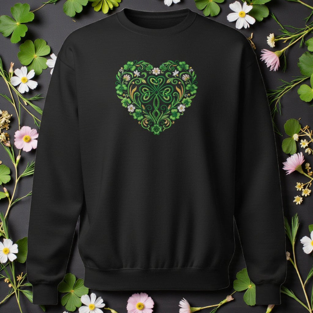 Black sweatshirt with a green floral heart design on a dark background with flowers and leaves.