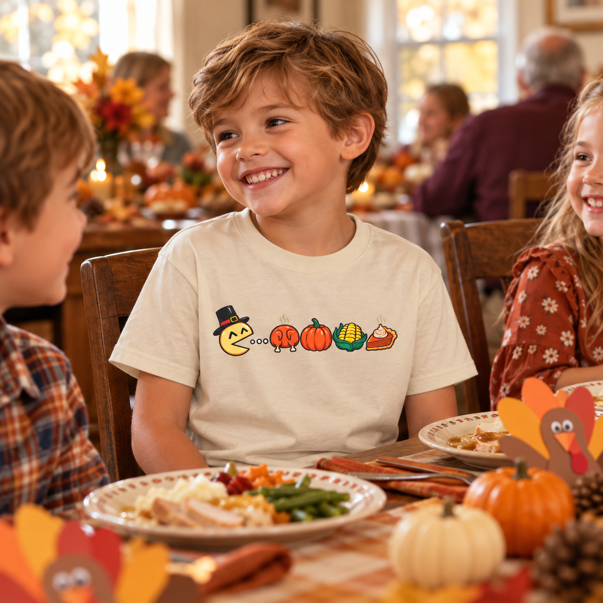 Cheerful Child in Thanksgiving Tee at the kids table.