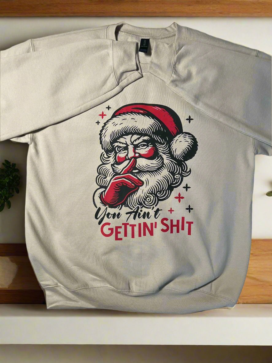 Novelty Christmas sweatshirt with Santa illustration and sassy text, perfect gag gift