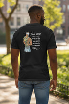 Man wearing a black t-shirt with a graphic design outdoors