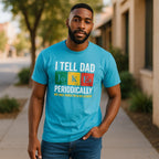 Man wearing funny dad jokes t-shirt with periodic table design on sidewalk.
