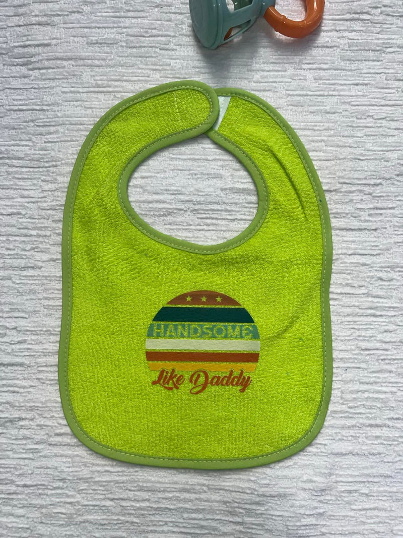 Irish green baby bib with a retro graphic that says: "Handsome Like Daddy"