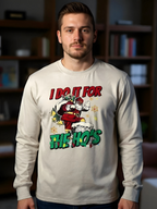 Man wearing a long-sleeve shirt with a graphic design in a room with bookshelves.