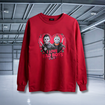 Red long-sleeve shirt with graphic design of two characters holding hands and 'I Love Bad Boys' text on a white background.