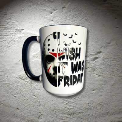 Mug with a hockey mask design and text 'I wish it was Friday' on a woods background.