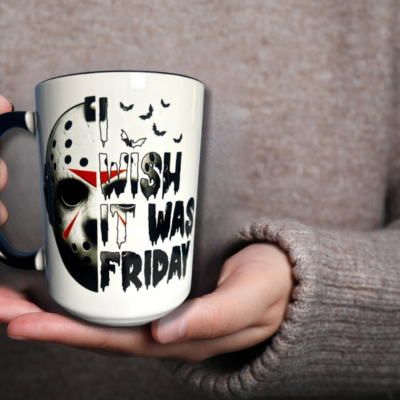 Mug with a hockey mask design and text 'I wish it was Friday' on a woods background.