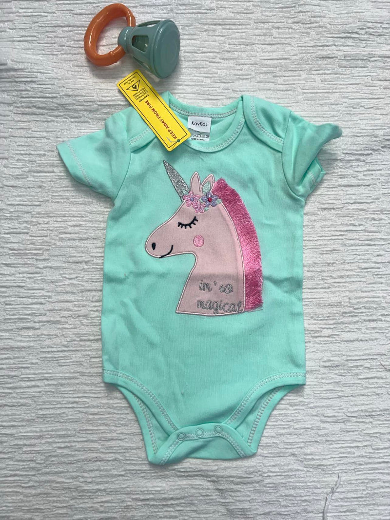 A green baby onesie with a pink unicorn with embroidery that says "I'm so Magical"