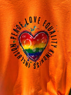 Close up of graphic of Pride t-shirt for parades, festivals or everyday wear.