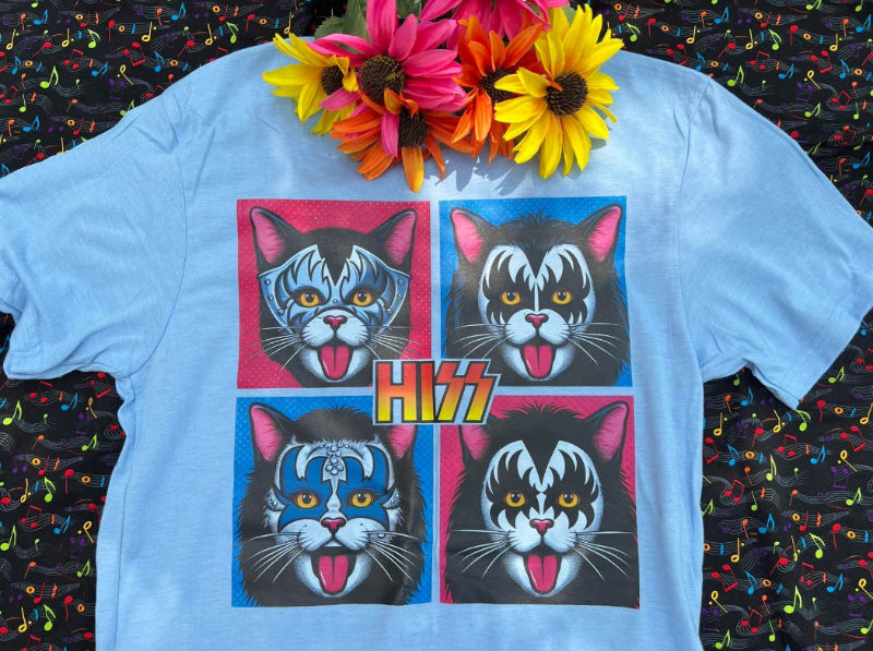 Light blue tee-shirt with cats that mimic the rock band Kiss