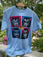 Light blue tee-shirt with cats that mimic the rock band Kiss