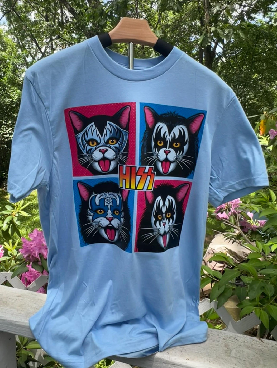 Light blue tee-shirt with cats that mimic the rock band Kiss