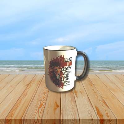 Mug with lion design and 'Man of Faith' text against a white background