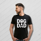 Man wearing a black 'DOG DAD' t-shirt on a yellow background
