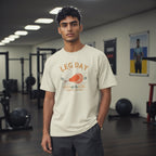 Man wearing a 'Leg Day Turkey Edition' t-shirt in a gym setting