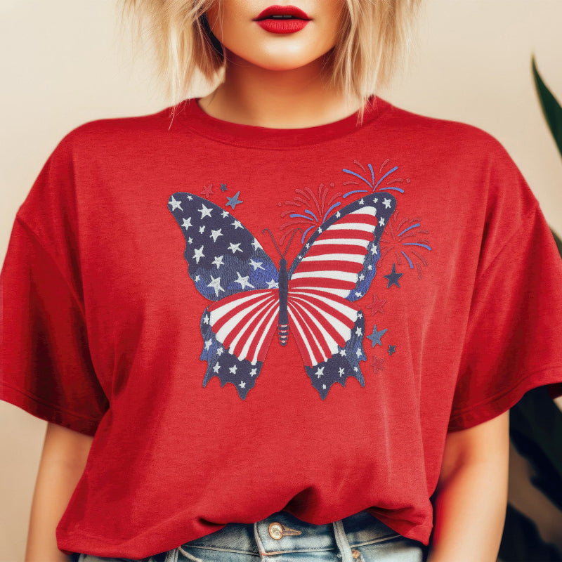 Woman in red American flag butterfly shirt for patriotic celebrations.
