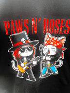 Close-up of graphic of cat musicians with guitars and bandanas on Paws N’ Roses tee.