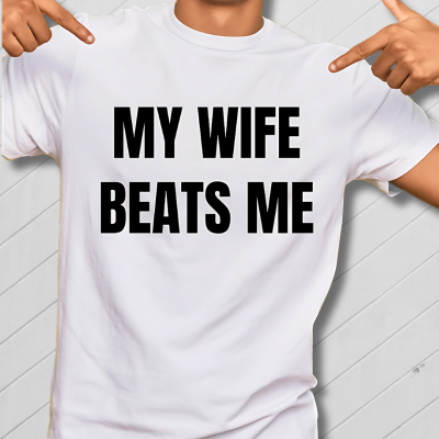 Person wearing a white t-shirt with 'MY WIFE BEATS ME' text 