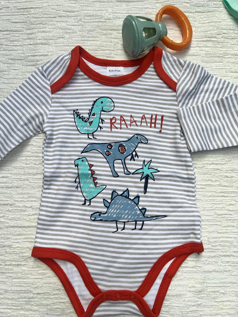 a striped baby onesie with dinosaurs with the word: RAAAH!