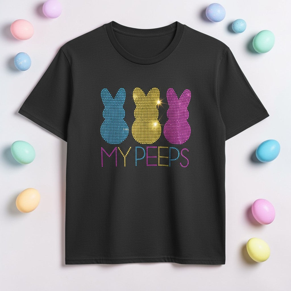Black t-shirt with colorful 'MY PEEPS' design on a light background with Easter eggs.