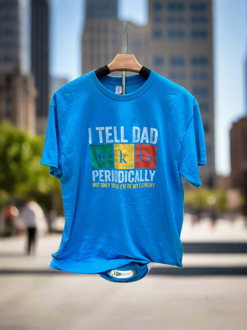 A Blue t-shirt with the saying "I Tell Dad Jokes Periodically But Only When I'm in my Element"