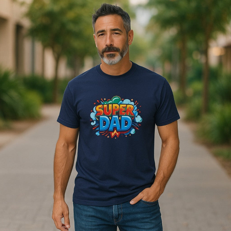 Man wearing Super Dad graphic tee in navy outdoors.