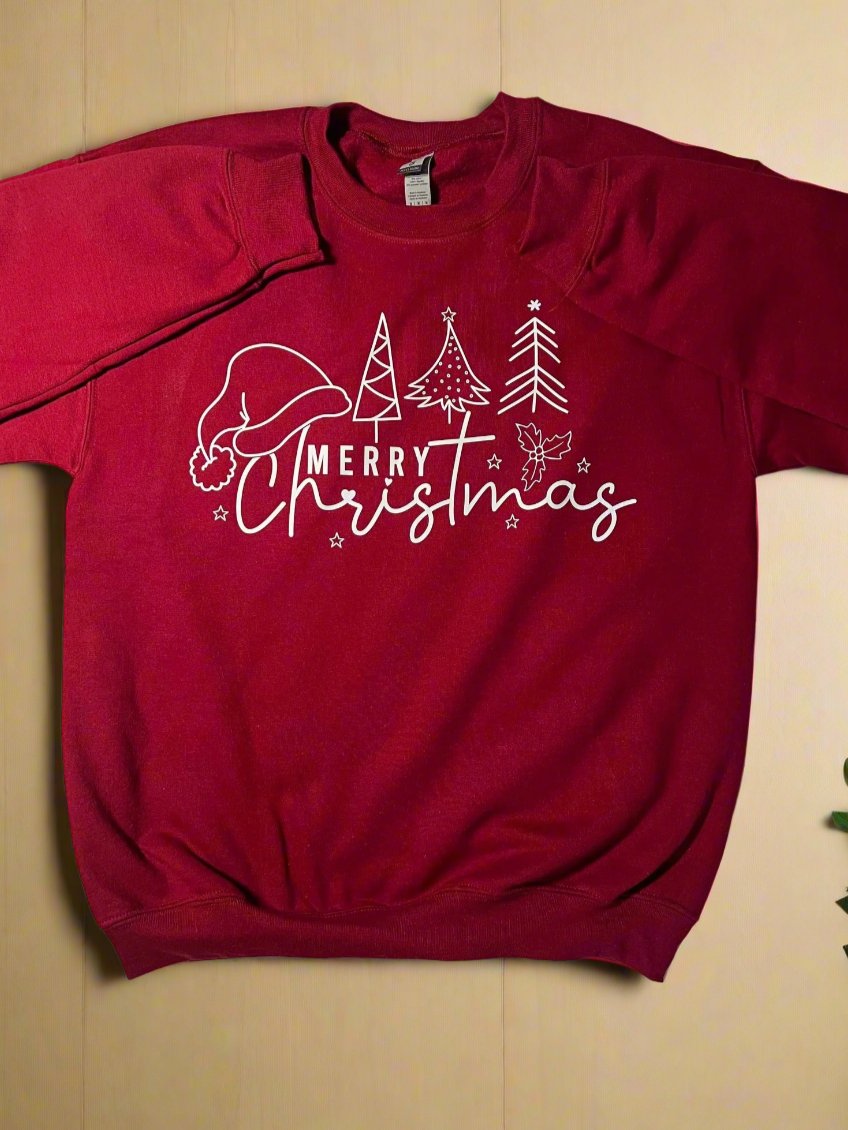 A red sweatshirt with 'Merry Christmas' text and a graphic of a Santa hat and Christmas trees on it.
