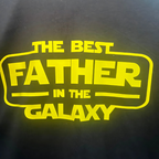 Close up of the graphic The Best Father in the Galaxy t-shirt.