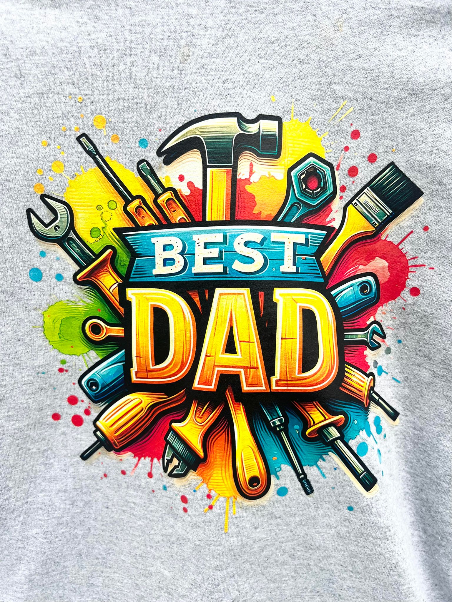 Close up of Best Dad gift shirt.