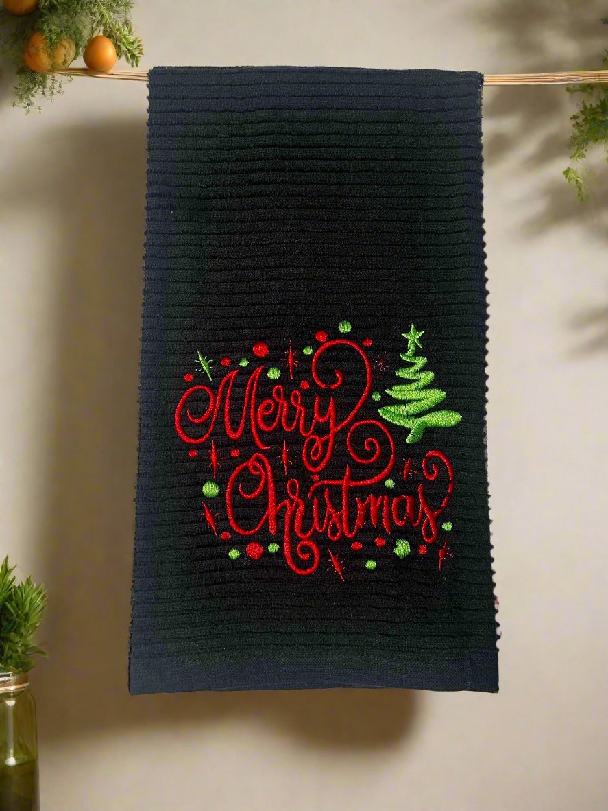 Embroidered holiday towel with red, green, and white “Merry Christmas” design