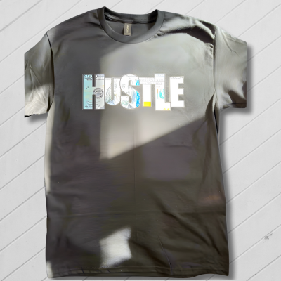 black t-shirt with 'HUSTLE' text on a gray background
