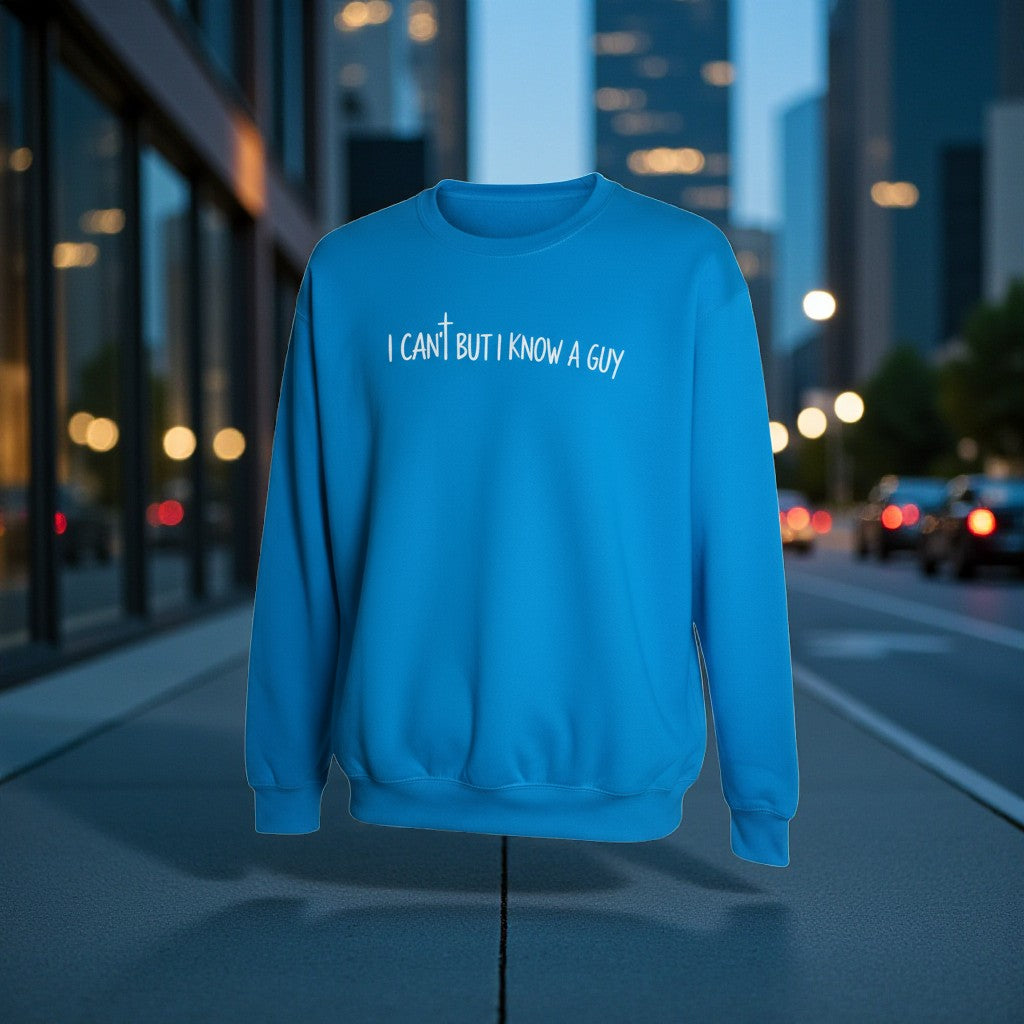 Blue sweatshirt with text on a city street at night