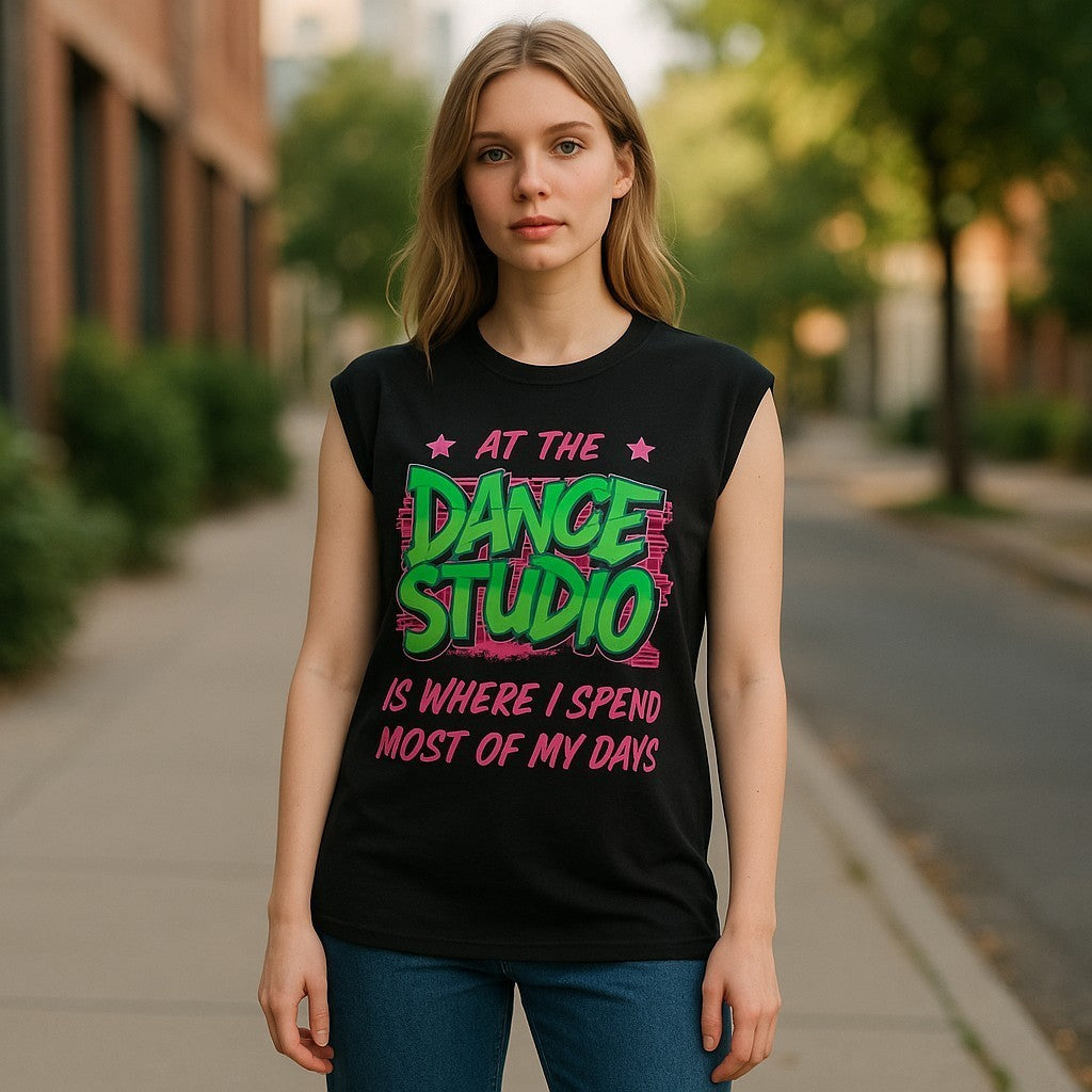 Woman wearing a black sleeveless shirt with colorful text on a street.