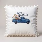 Decorative pillow with 'Happy Easter' text and blue truck design on a white background