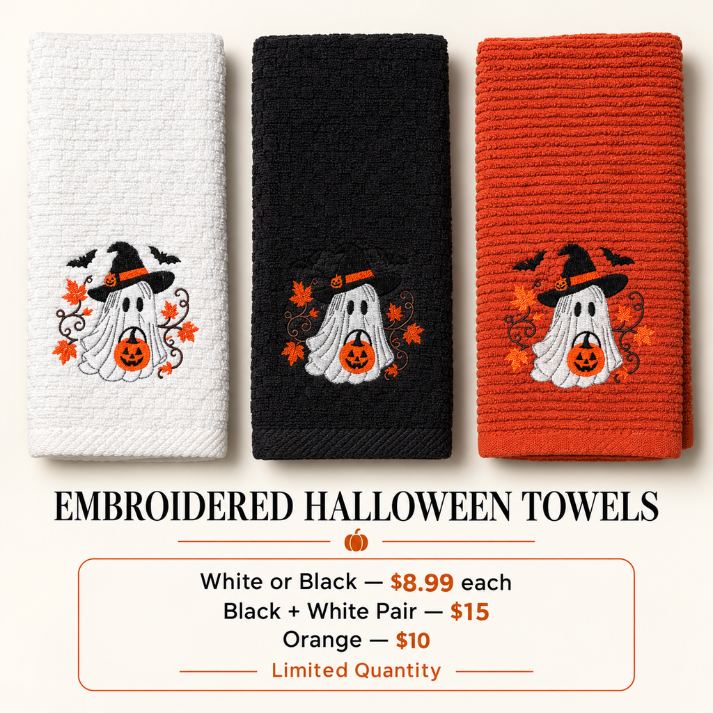 White, black, and orange embroidered Halloween kitchen towels with pricing