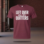 Maroon t-shirt with 'LEFT OVER are for QUITTERS' text on a brick wall background
