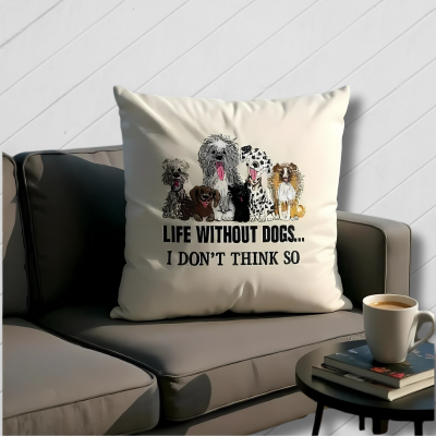 Decorative pillow with dog illustrations and text on a couch