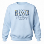 Light blue sweatshirt with 'Blessed to be a blessing' text on a white background