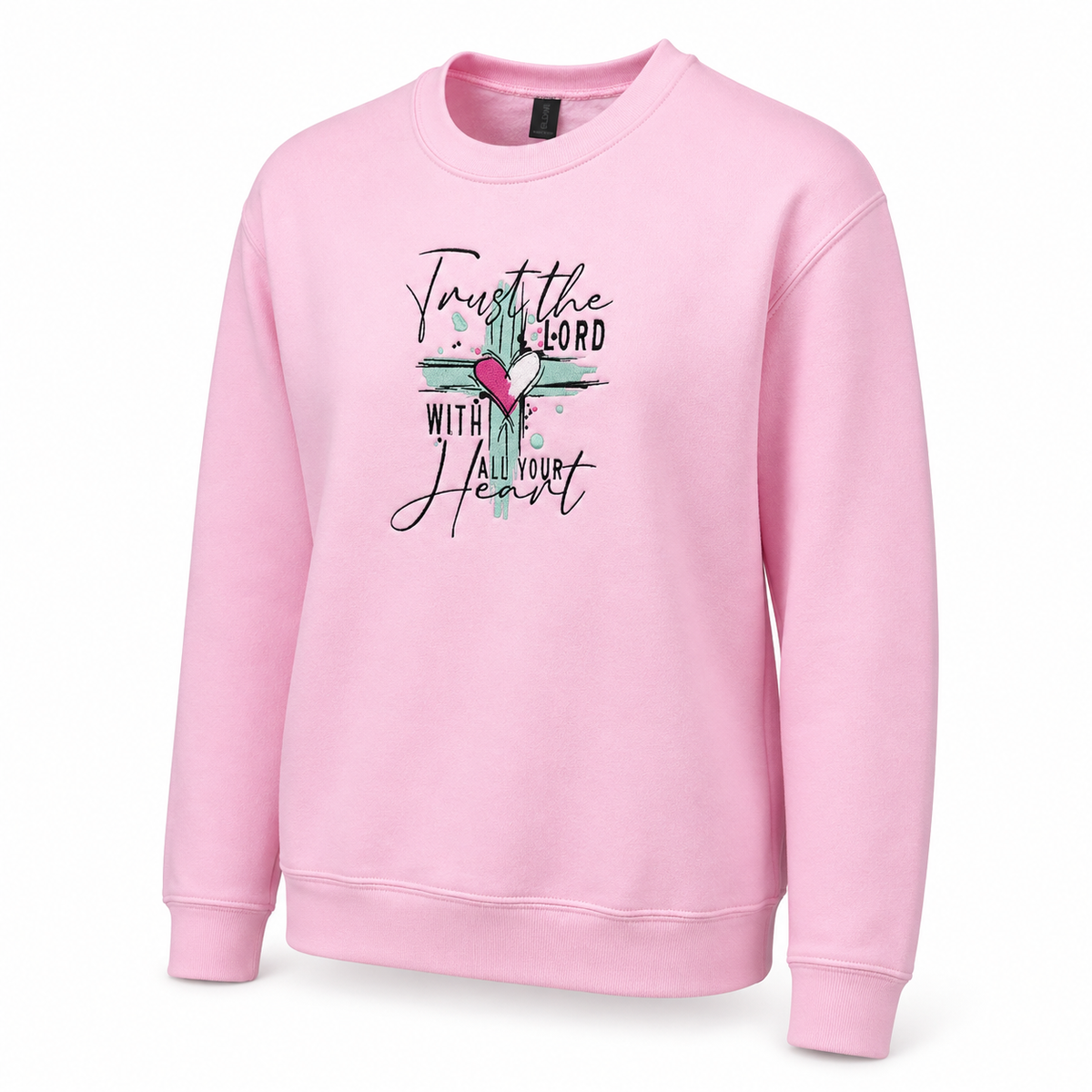A light pink crewneck sweatshirt with a embroidered design on the front that reads 'Trust the LORD with all your heart' in black script, decorated with a pink and white heart and teal paint strokes.