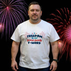 Man wearing a white t-shirt with a patriotic design and fireworks in the background