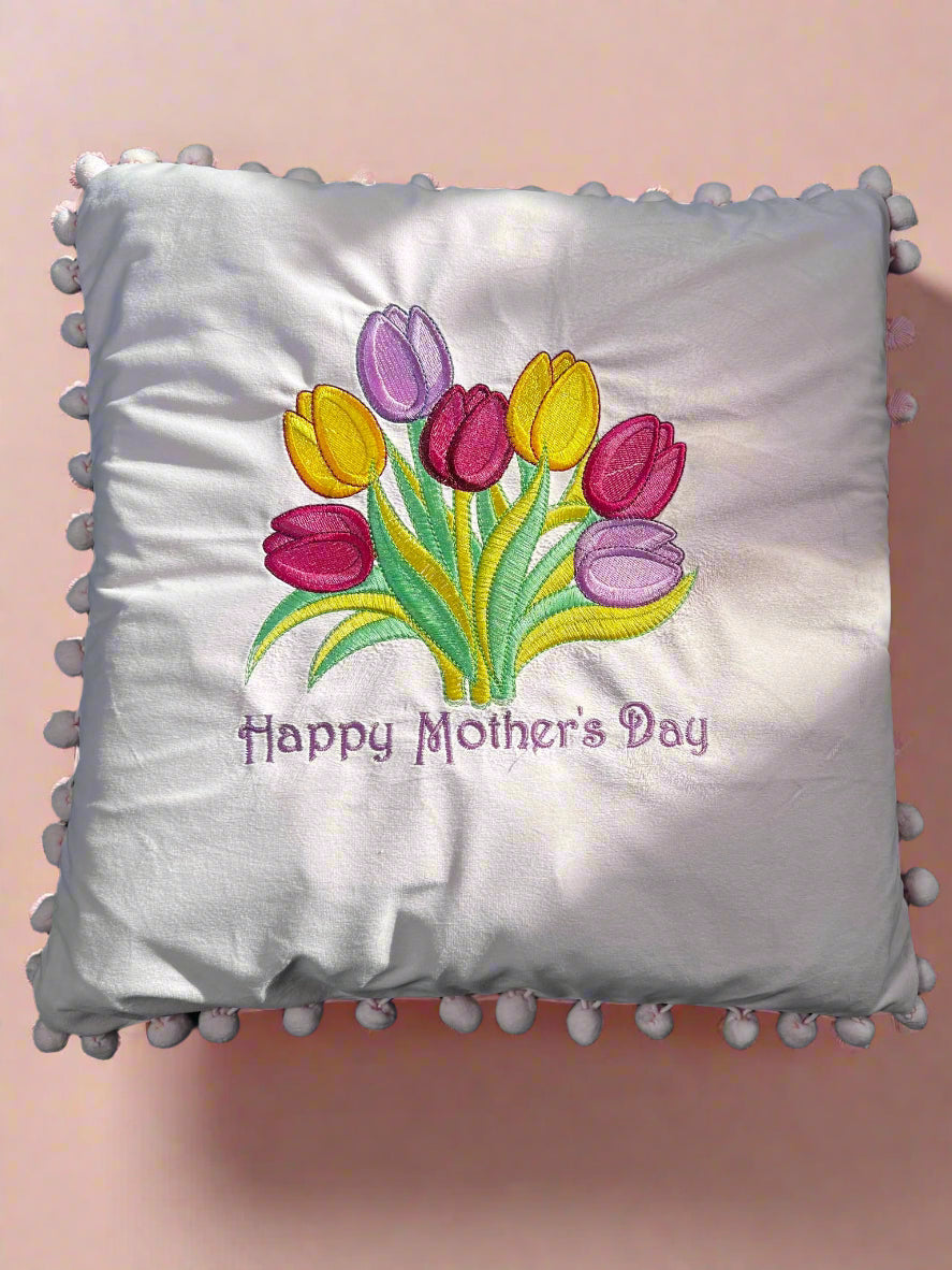 mothers day embroidery pillow with a pink back drop