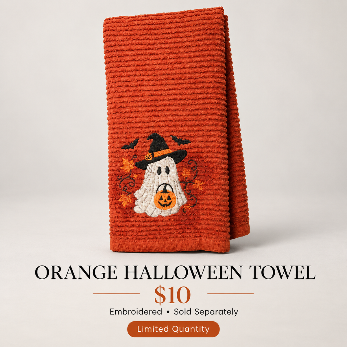 Orange embroidered Halloween kitchen towel