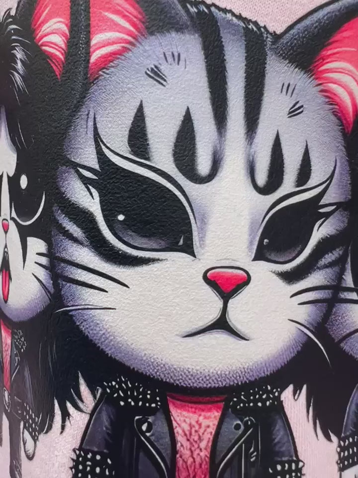 Video of a Pink Meowtallica retro cat parody t-shirt hanging outdoors.
