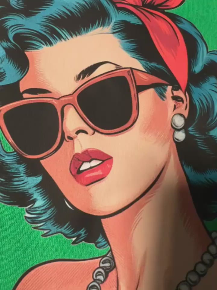 A green long sleeve tee with a graphic of a woman in sunglasses giving a peace sign and the text 'RESPECTFULLY' below it.