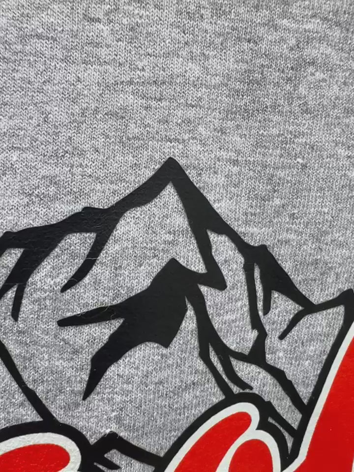 Video of close-up of Cool Dad shirt graphic design inspired by beer logo.