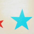 Video of white graphic t-shirt with red, white, and blue fireworks design and the funny quote “Freedom Is My Second Favorite F-Word close up on focal point.